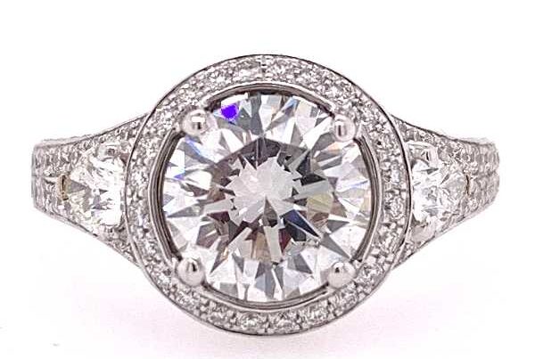 Round brilliant diamond halo engagement ring