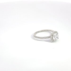 halo diamond engagement ring on white background