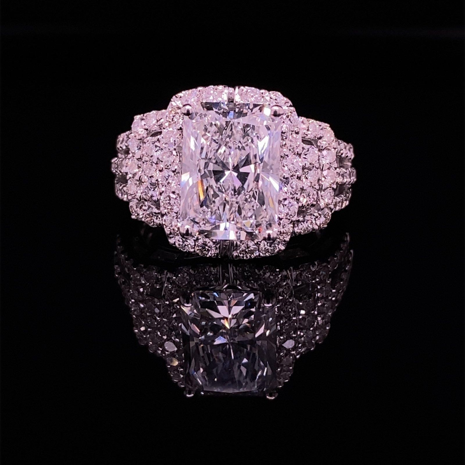 Cushion-cut diamond engagement ring with halo