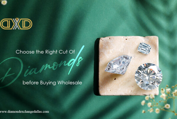 Three diamonds on green silk backdrop