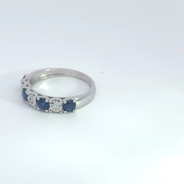 Silver ring with blue sapphires and diamonds