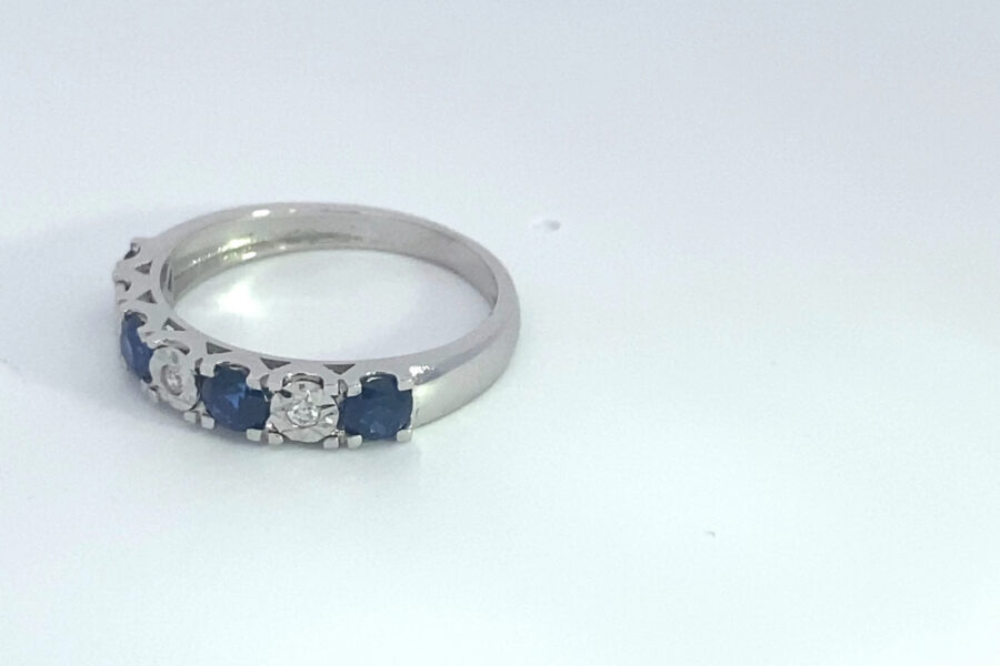 Silver ring with blue sapphires and diamonds
