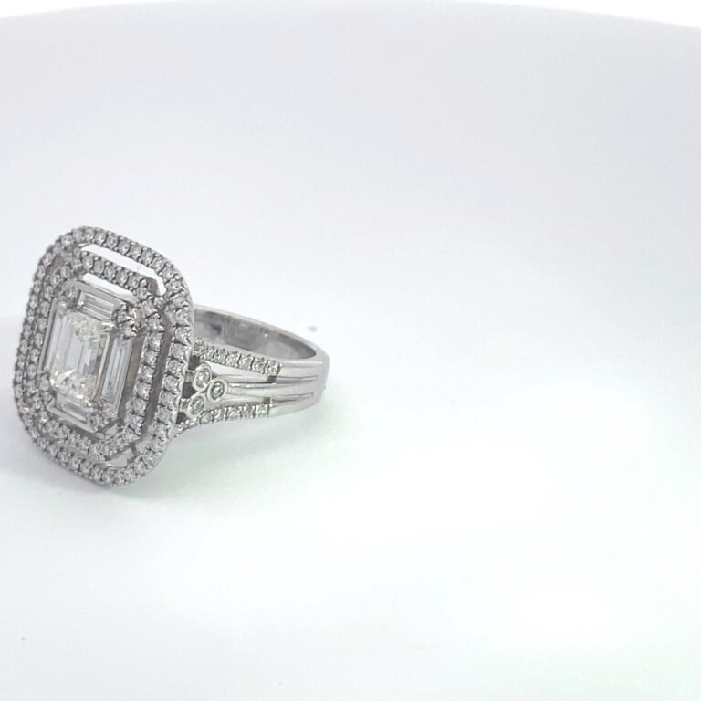 Emerald-cut diamond halo engagement ring
