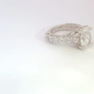 Round diamond engagement ring with pave band Round diamond engagement ring with pave band