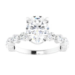 Round solitaire diamond engagement ring with side diamonds Round solitaire diamond engagement ring with side diamonds