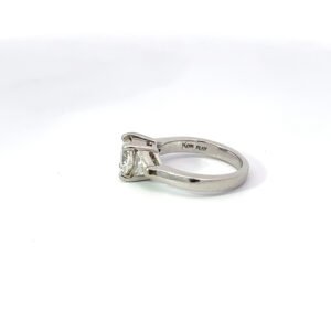 Solitaire diamond engagement ring on white background