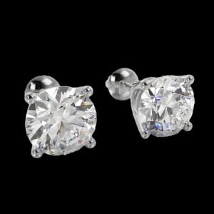Pair of solitaire round diamond stud earrings