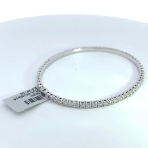 14K white gold flexible tennis bracelet with 2.70 carats of natural round diamonds and tag