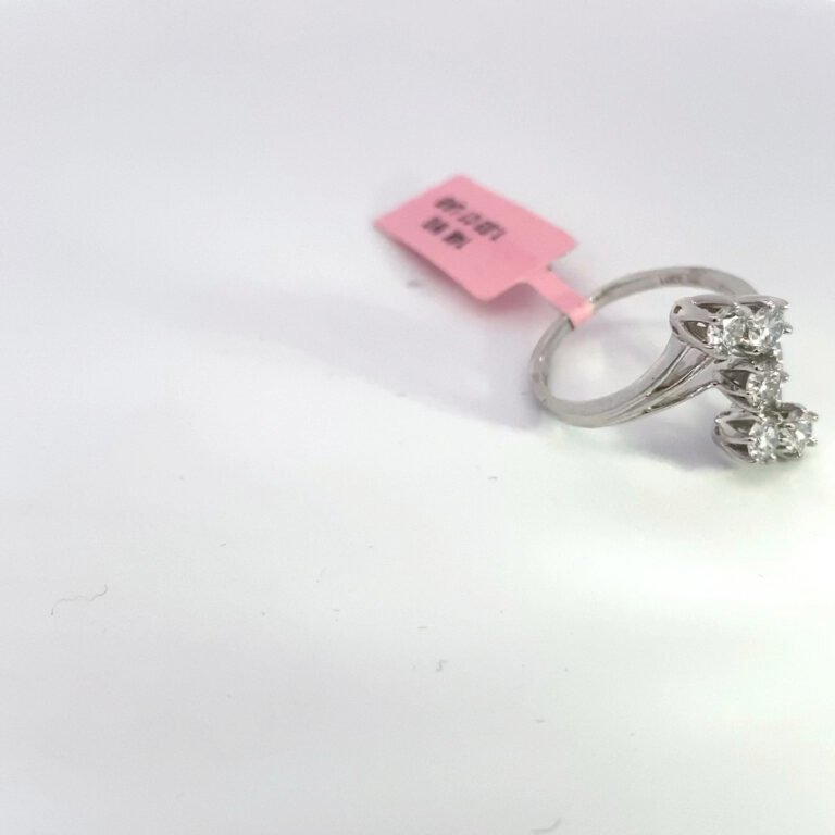 Diamond ring with pink price tag