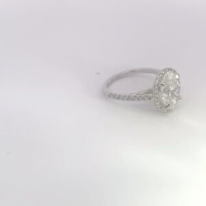 Round diamond halo engagement ring on white 14K white gold oval halo ring with 3.01 ct E VS1 diamond and pavé diamond band