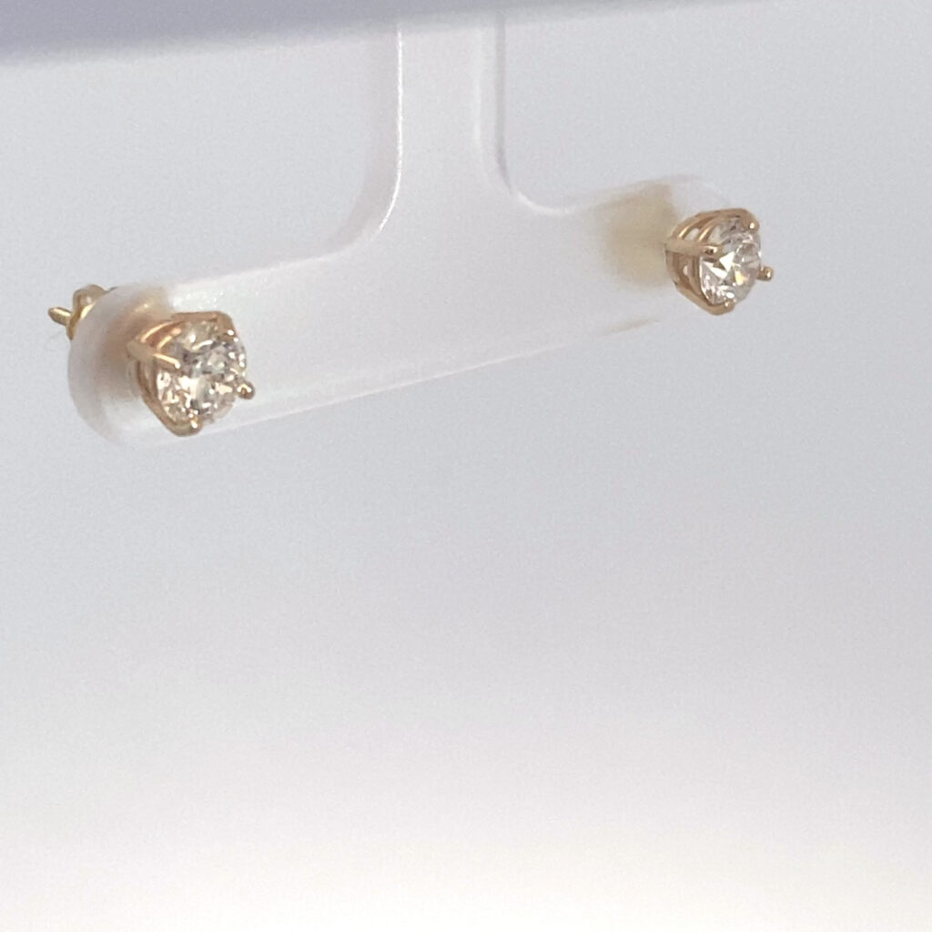 Pair of gold diamond stud earrings