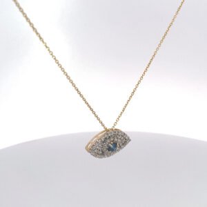 14K yellow gold evil eye pendant with lab-grown diamond pavé and blue center stone on a delicate chain